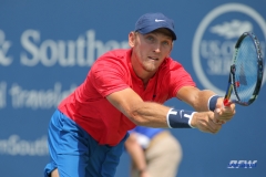 CINCINNATI, OH - AUGUST 16: Mitchell Krueger (USA) stretches for a backhand during the Western & Southern Open at the Lindner Family Tennis Center in Mason, Ohio on August 16, 2017.(Photo by George Walker/Icon Sportswire)