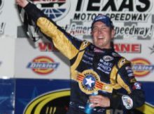 Kurt Busch celebrates in Victory Lane after winning the 2009 NASCAR Dickies 500 at Texas Motor Speedway. Photo by George Walker.
