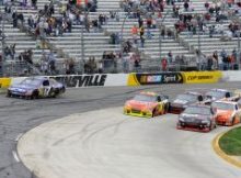 After starting the green-white-checkered finish in fourth position, Denny Hamlin pushed his way to the front of the field and took the lead when Matt Kenseth cut across the field but couldnt stay in the groove. Credit: John Harrelson/Getty Images for NASCAR