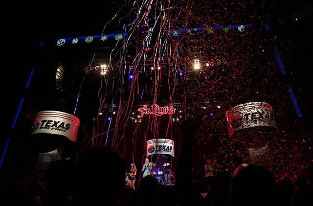 Confetti falls during the 2011 Schedule Announcement Party for Texas Motor Speedway at the House of Blues on August 17, 2010 in Dallas, Texas. (Photo by Ronald Martinez/Getty Images for Texas Motor Speedway)