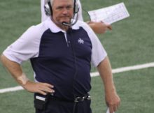 Wade Phillips in his final home game as head coach of the Dallas Cowboys, with Jason Garrett in the background. Photo by George Walker.
