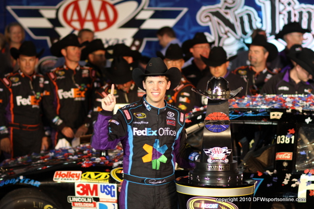 Denny Hamlin celebrates in Victory Lane after winning the AAA Texas 500 at Texas Motor Speedway. Photo by George Walker.