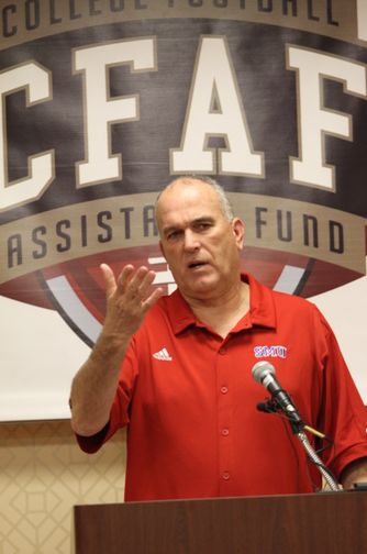 SMU coach June Jones announces the College Football Assistance Fund. Photo by George Walker