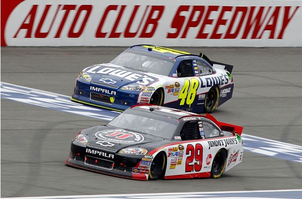 Kevin Harvick crosses the finish line 0.14 seconds ahead of Jimmie Johnson to win the Auto Club 400, his first win at Auto Club Speedway. Credit: Todd Warshaw/Getty Images for NASCAR