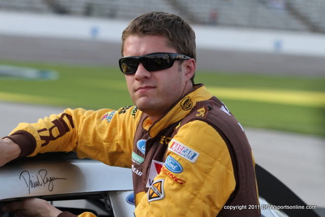 David Ragan climbs out of his car after qualifying at Texas Motor Speedway. Photo by George Walker