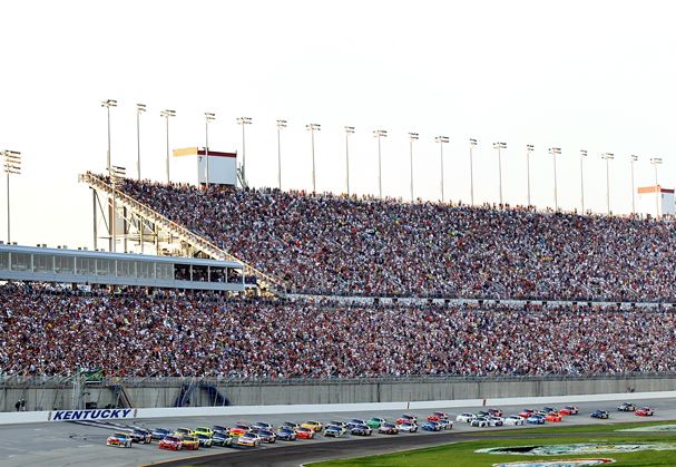 Kyle Busch takes the green flag in front of a sold out crowd for the inaugural Quaker State 400 at Kentucky Speedway. Credit: Andy Lyons/Getty Images for NASCAR