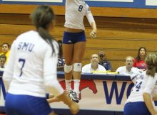 SMU's Caroline Young reaches high for the Mustangs. Photo by George Walker for DFWsportsonline
