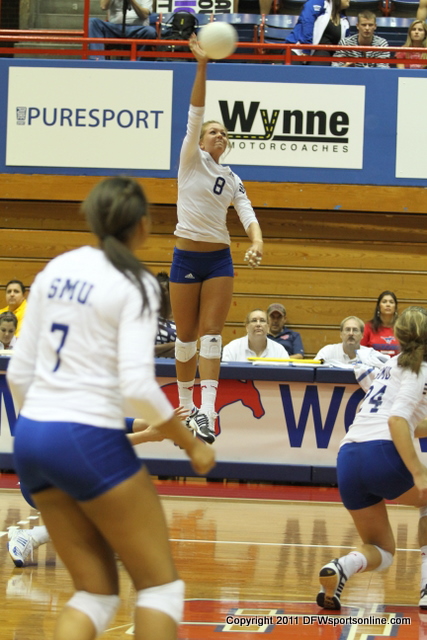 SMU's Caroline Young reaches high for the Mustangs. Photo by George Walker for DFWsportsonline