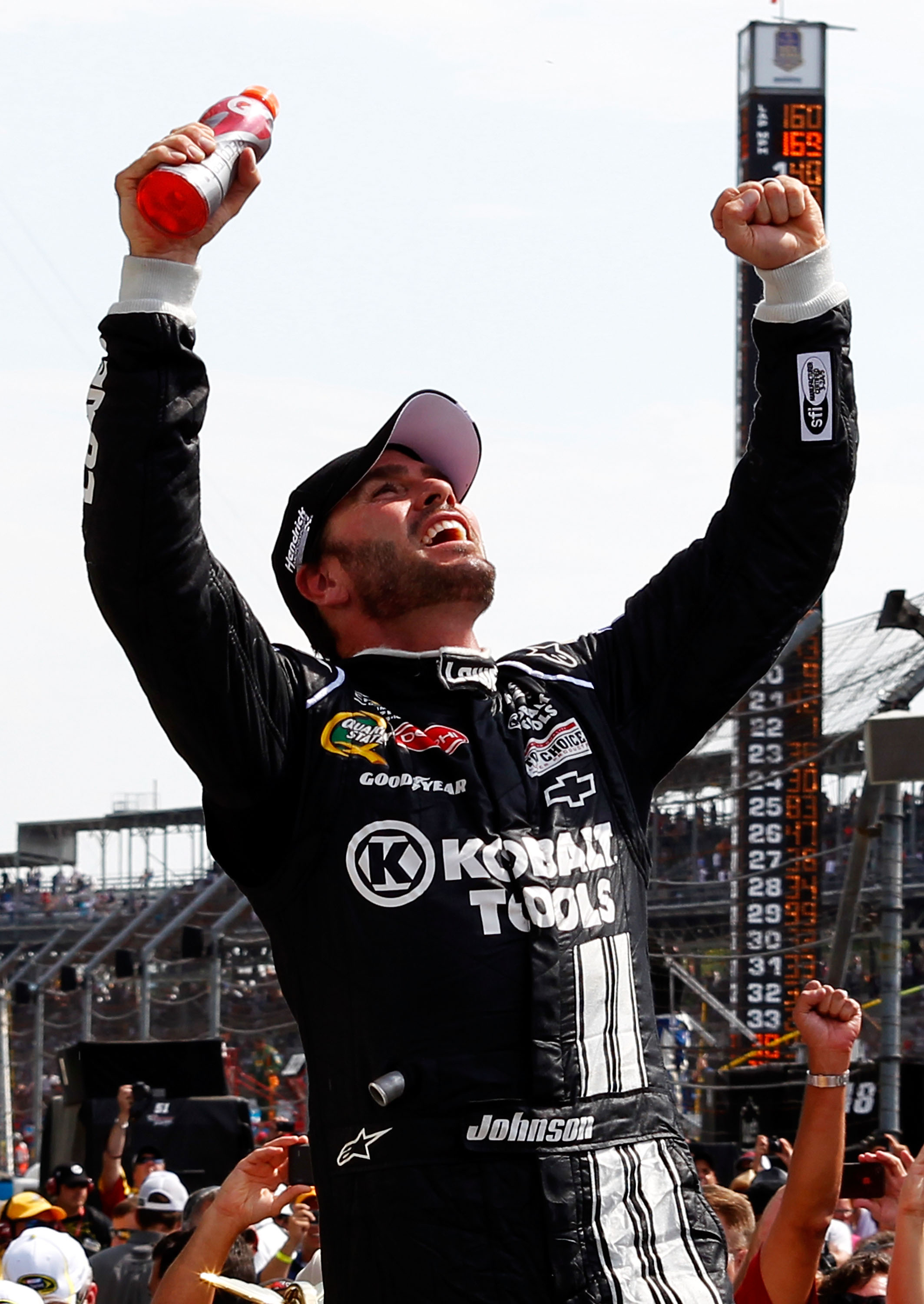 jimmie-johnson-verticle-victory-lane-brickyard-2012