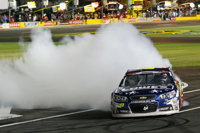 Credit: 298586Matt Sullivan/Getty Images Jimmie Johnson, driver of the #48 Lowe's Patriotic Chevrolet, celebrates with a burnout after winning the NASCAR Sprint Cup Series Coca-Cola 600 at Charlotte Motor Speedway on May 25, 2014 in Charlotte, North Carolina.