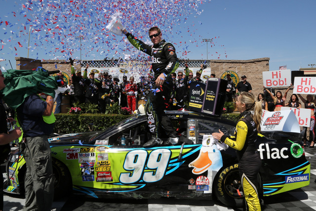 SONOMA, CA - JUNE 22: Carl Edwards, driver of the #99 Aflac Ford, celebrates i Victory Lane after winning the NASCAR Sprint Cup Series Toyota/Save Mart 350 at Sonoma Raceway on June 22, 2014 in Sonoma, California. (Photo by Jerry Markland/Getty Images)